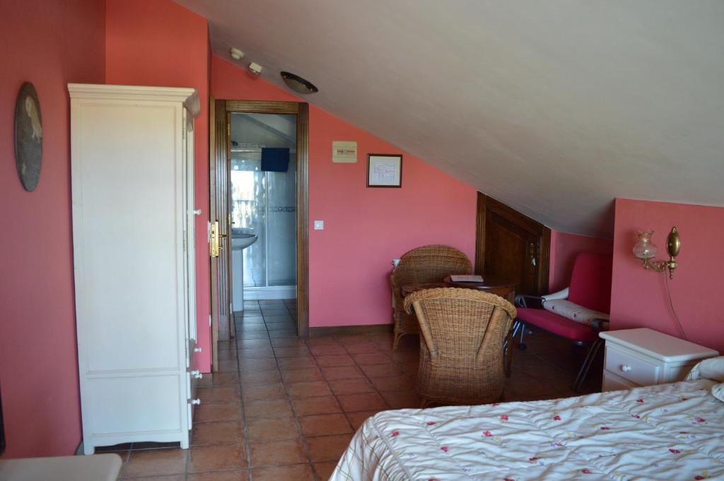 Postel nebo postele na pokoji v ubytování La Casona de Quintes