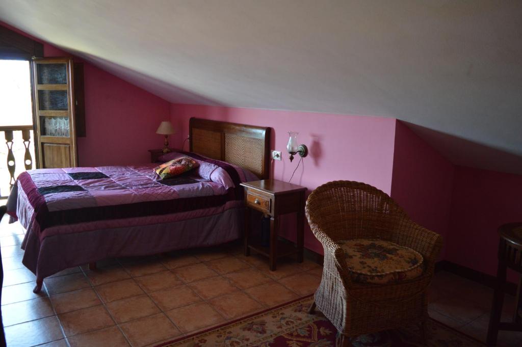 Postel nebo postele na pokoji v ubytování La Casona de Quintes