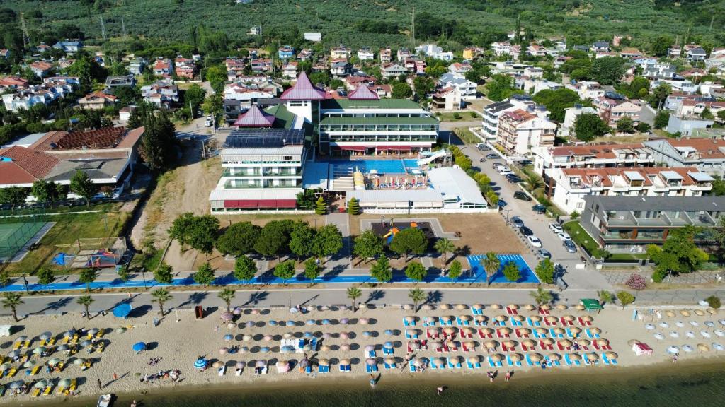 an aerial view of a city with a beach and buildings at Ceti̇n Presti̇ge Resort in Erdek