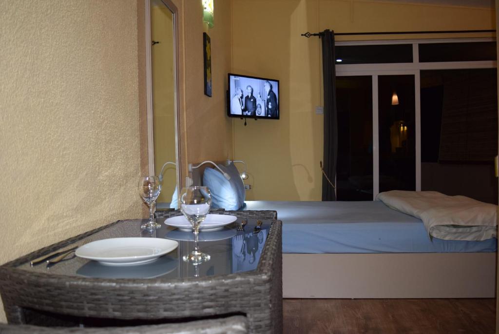 Postel nebo postele na pokoji v ubytování Baywatch Apartment