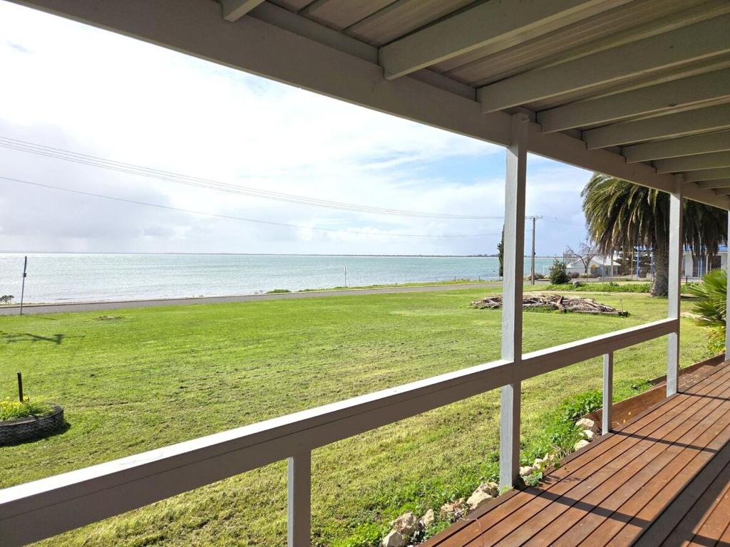 a porch with a view of the ocean at 38 at Point Turton in Point Turton