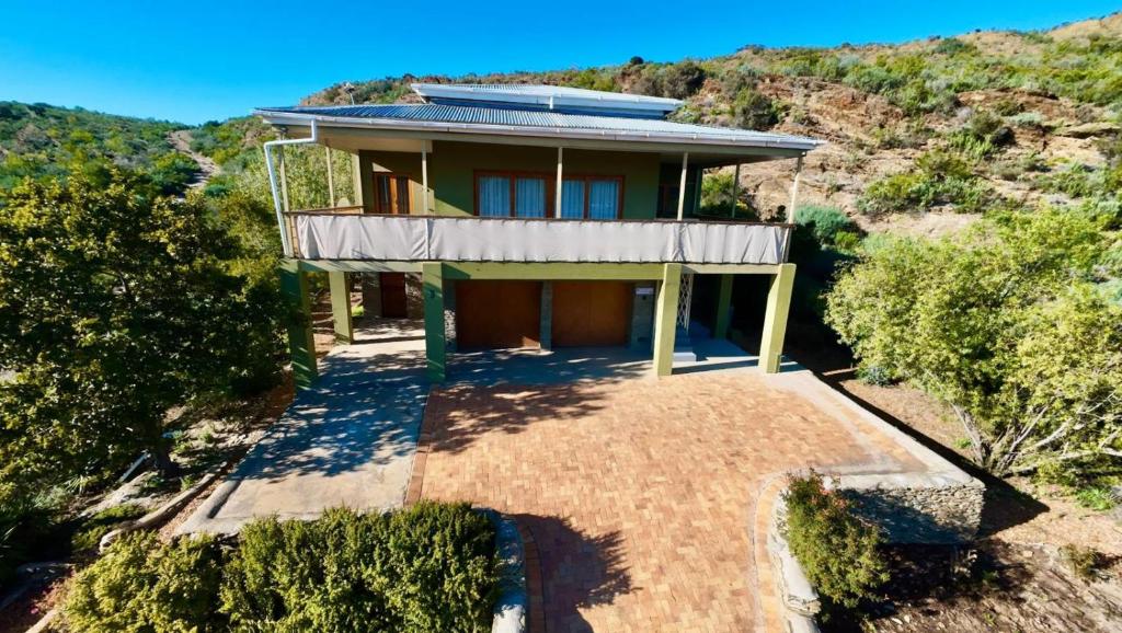 an aerial view of a house on a hill at Zion's Rest in Barrydale