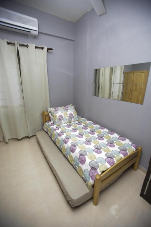 Postel nebo postele na pokoji v ubytování Putra Harmoni Putrajaya (Tiny Suite, 3 AC Bedrooms, 1 Bath, WiFi, Ground Floor) by MRK