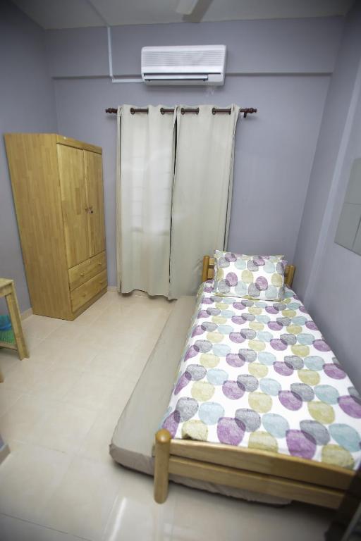 Postel nebo postele na pokoji v ubytování Putra Harmoni Putrajaya (Tiny Suite, 3 AC Bedrooms, 1 Bath, WiFi, Ground Floor) by MRK