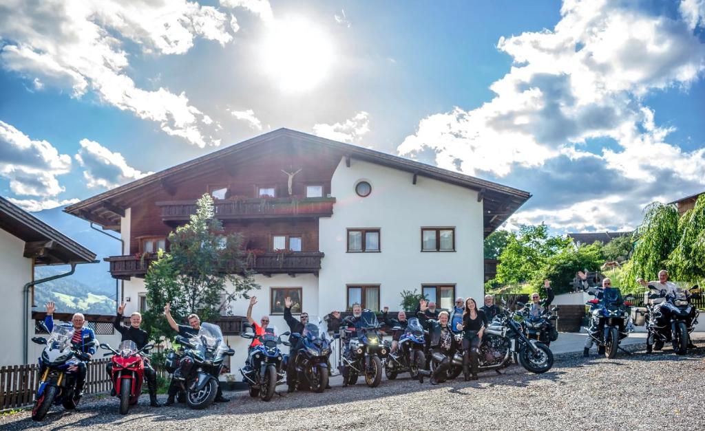 a group of motorcycles parked in front of a building at Hotel Marienhof in Fliess