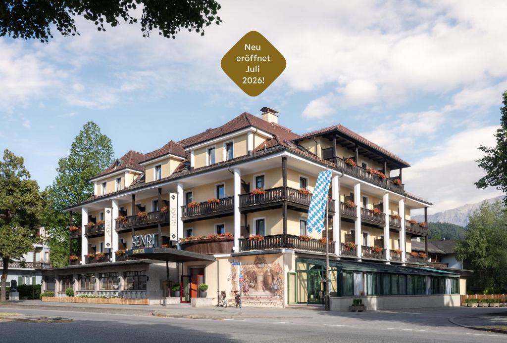 a hotel with a sign that reads notouched inn at HENRI Hotel Garmisch-Partenkirchen in Garmisch-Partenkirchen