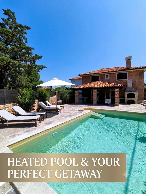 a villa with a heated pool and your perfect getaway at Holiday House Ursa with heated pool in Krk