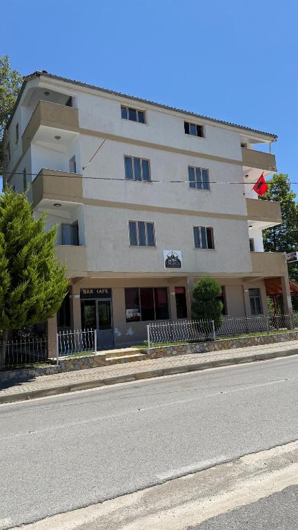 a building on the side of a street at Hotel Engjell in Pogradec