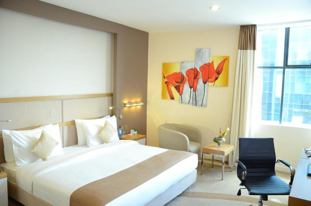 Postel nebo postele na pokoji v ubytování PrideInn Azure Hotel Nairobi Westlands