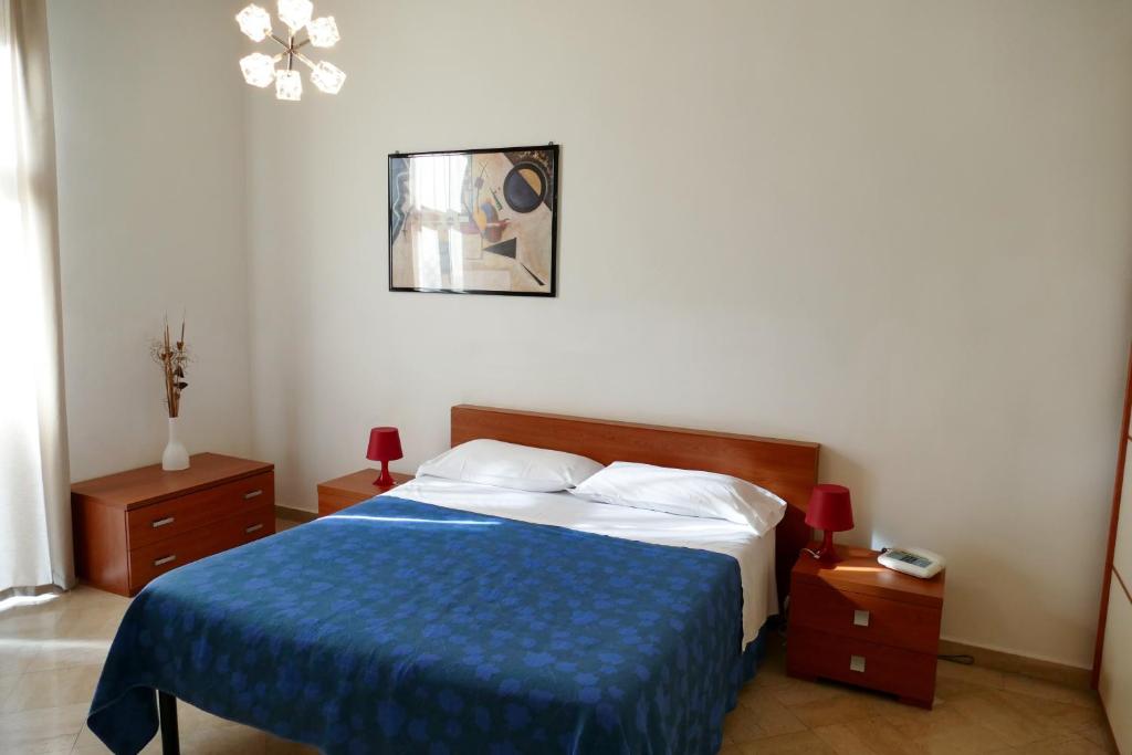 Postel nebo postele na pokoji v ubytování Visa Residence