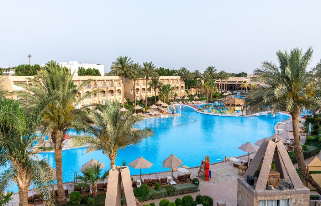 an overhead view of a large pool at a resort at PLM hotel Prima Life Makadi in Hurghada