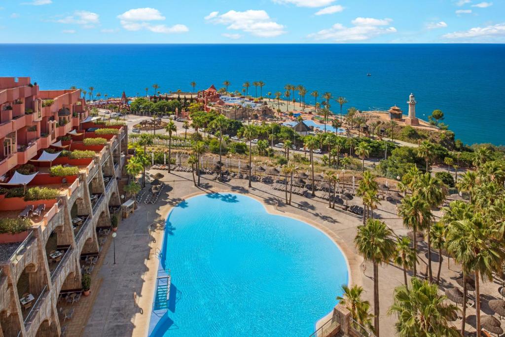 an aerial view of a resort with a pool at Holiday World Polynesia, Affiliated by Meliá in Benalmádena