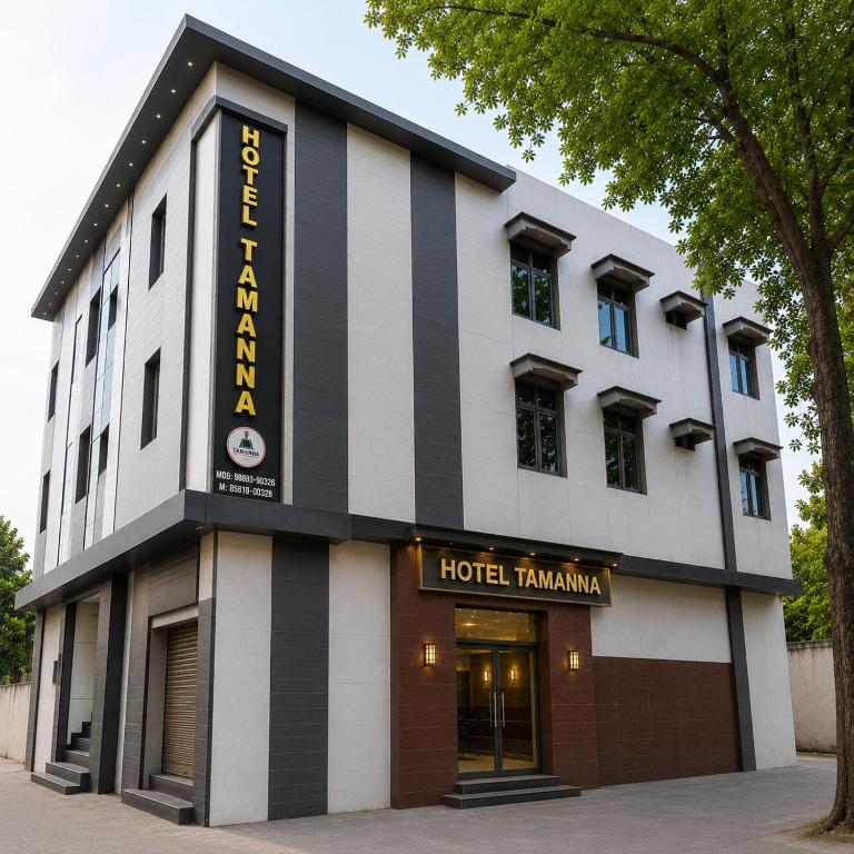 a hotel with a black and white building at Hotel Tamanna 2 Minute Walk from Golden Temple in Amritsar