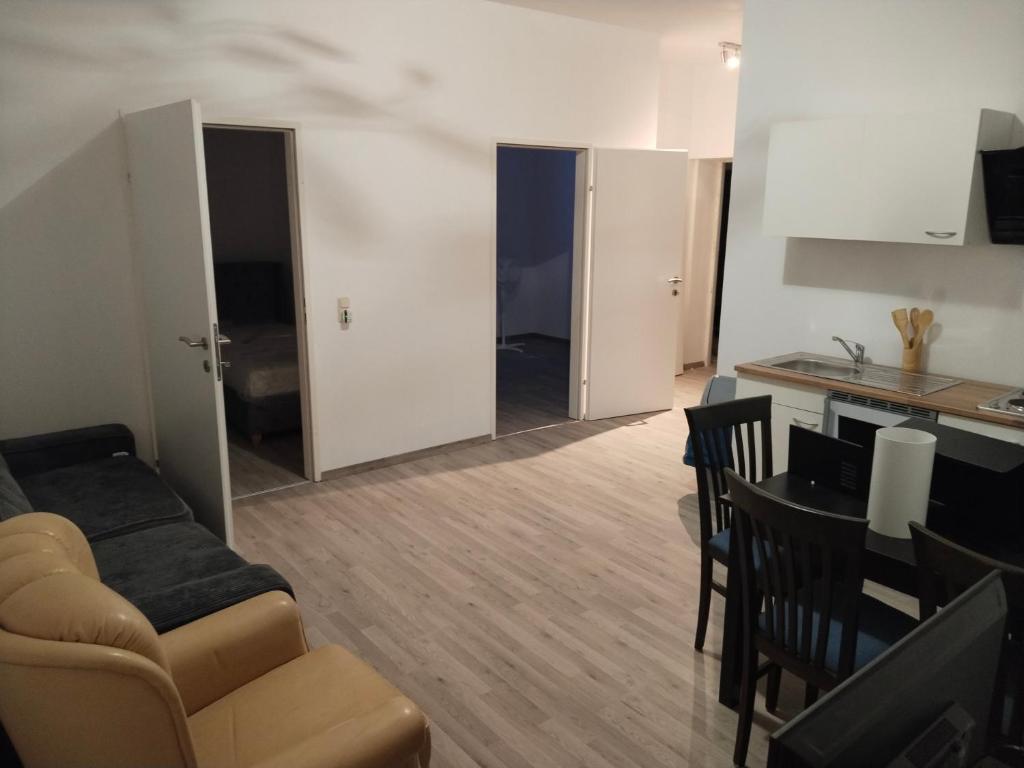 a living room with a couch and a table at Apartment 2 in Golling an der Erlauf in Petzenkirchen