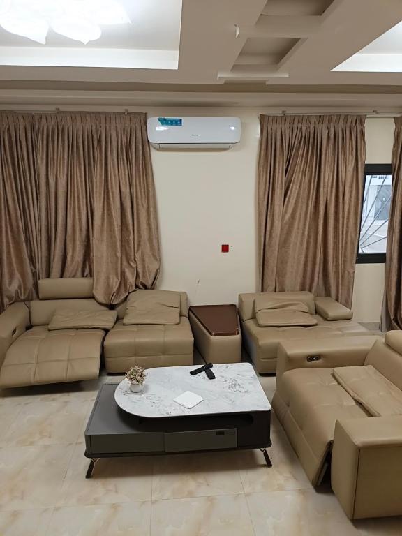 a living room with a couch and a table at Bbimo in Dakar