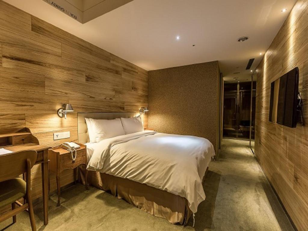 Postel nebo postele na pokoji v ubytování Inhouse Hotel Taichung