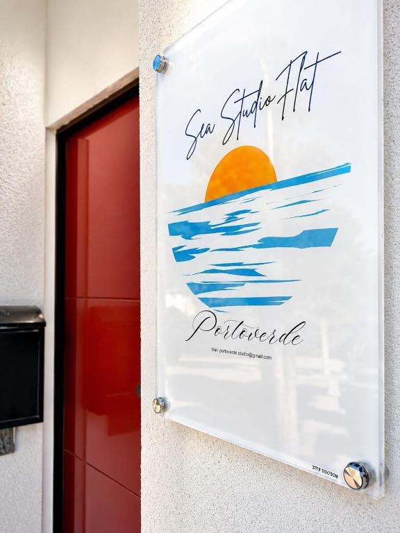 a sign on a building that reads you shorter than patriarchy at SEA Studio Flat in Misano Adriatico