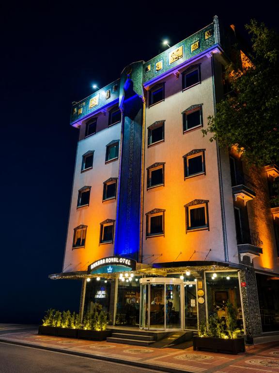 a tall building with a blue light on it at Ankara Royal Hotel in Ankara