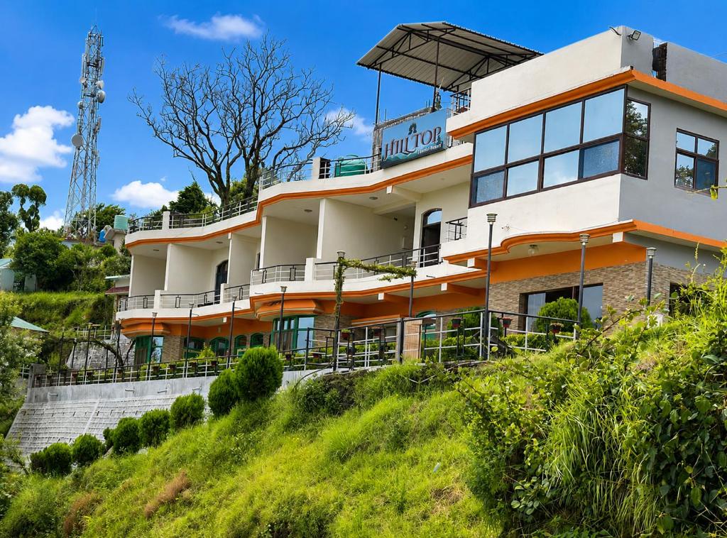 a building on the side of a hill at Hotel Hill Top Palace in Lansdowne