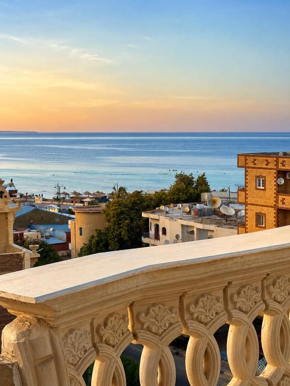 a view of the ocean from a balcony at Safaga SeaView Rooftop in Safaga