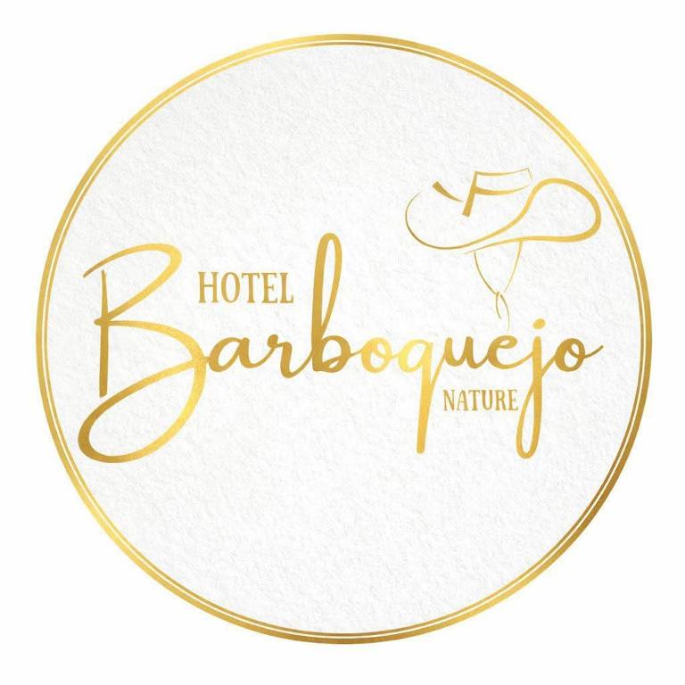 a logo for a hotel barbershop with a hat at hotel brb nature acacias in Acacías