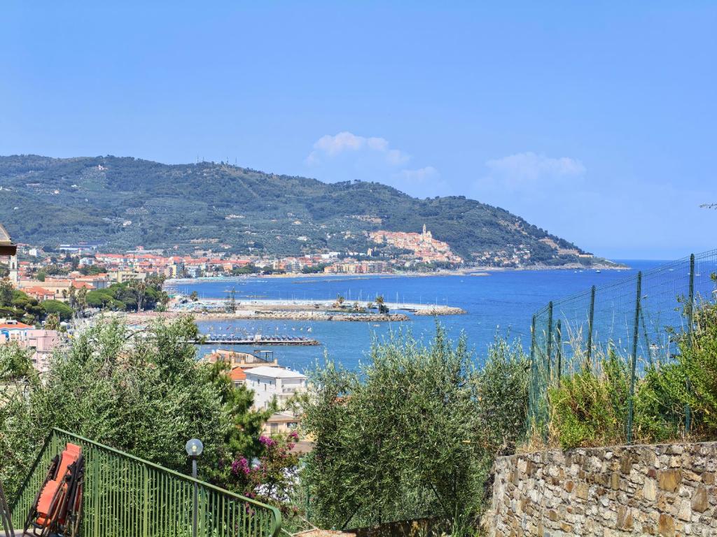 a view of a city and a body of water at Villa Capo Berta View in Diano Marina