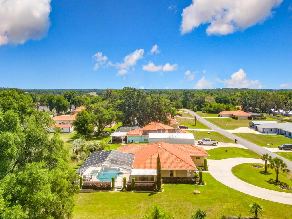 an aerial view of a park with a building at 3BR Home Trailside Pool & Jacuzzi, Minutes from Inverness, Ocala & Crystal River in Inverness