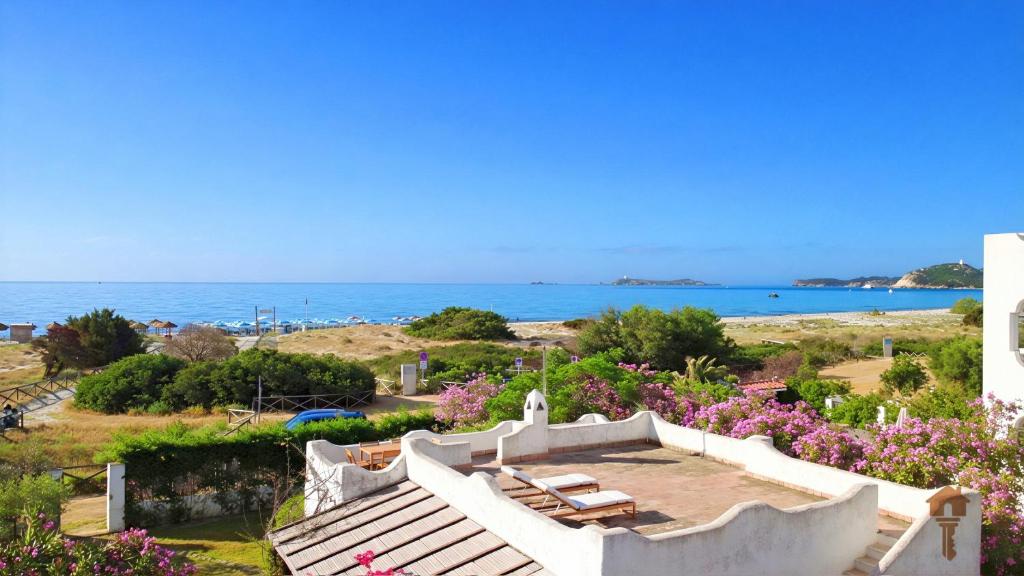 a view of the ocean from a house at Villa Florineth in Simius