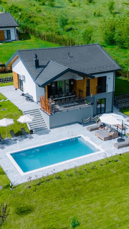 an overhead view of a house with a swimming pool at Oakville House - Kosmaj - Avala in Mala Ivanča