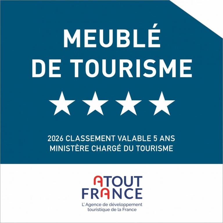 a sign that says neville de tourism with white stars at Finn Lodge in Saint-Denis-dʼOléron