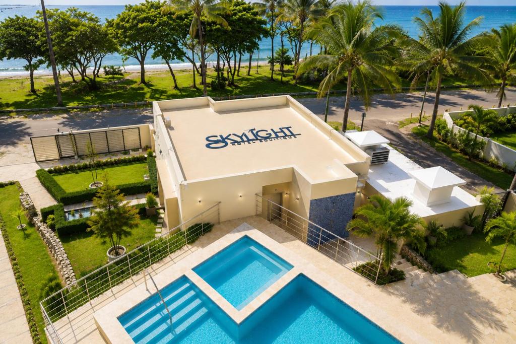 an aerial view of a villa with a swimming pool at Skylight Suites Hotel in San Felipe de Puerto Plata