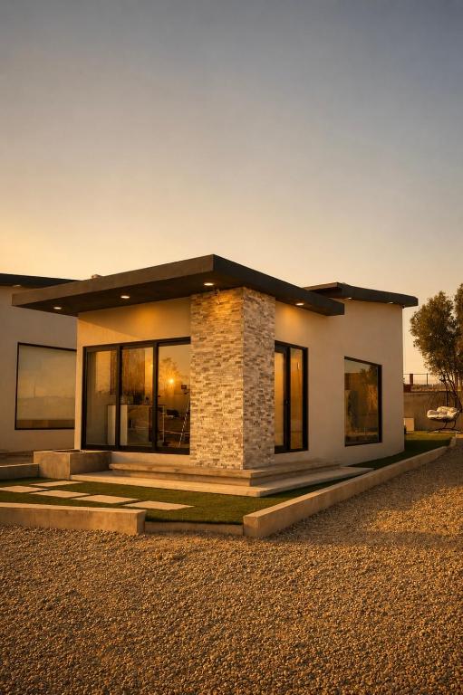 a small white house with a lot of windows at Sed de Valle-Valle de Guadalupe in Ensenada