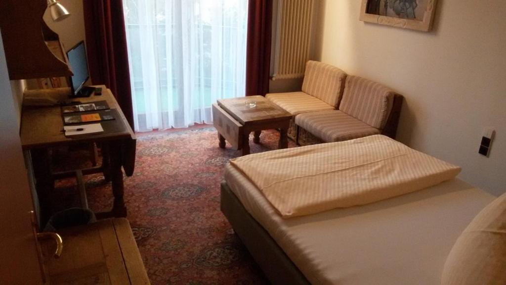 Postel nebo postele na pokoji v ubytování Solitaire Hotel