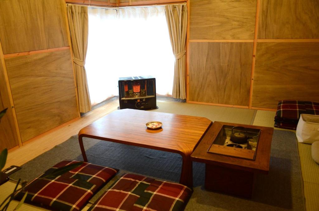 TV a/nebo společenská místnost v ubytování Sai no Tsuno Guest House