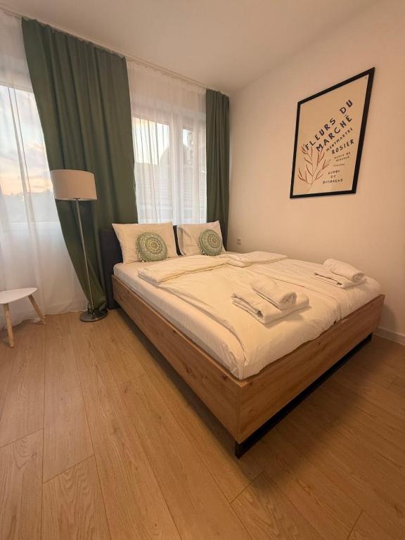 a bedroom with a large bed in a room at Capital Stay Old Town in Sarajevo