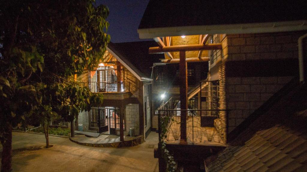 a house at night with its lights on at Runda Lofts in Nairobi