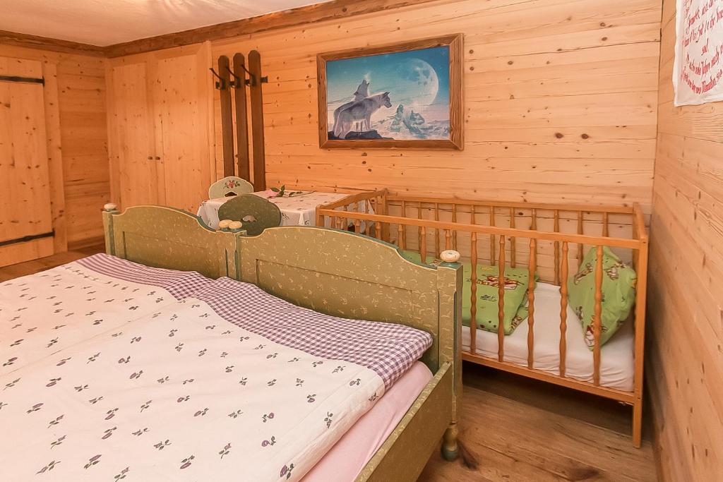 Postel nebo postele na pokoji v ubytování Müllerkaser