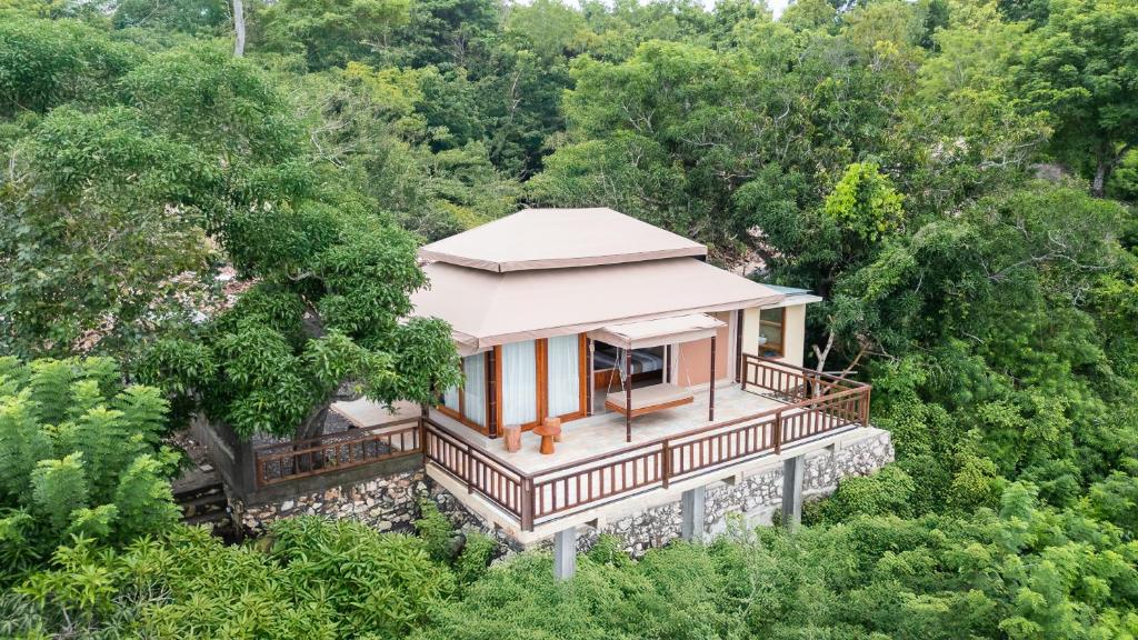 an overhead view of a house in the woods at The Agung & Sunset Tent by BaliSuperHost in Nusa Penida