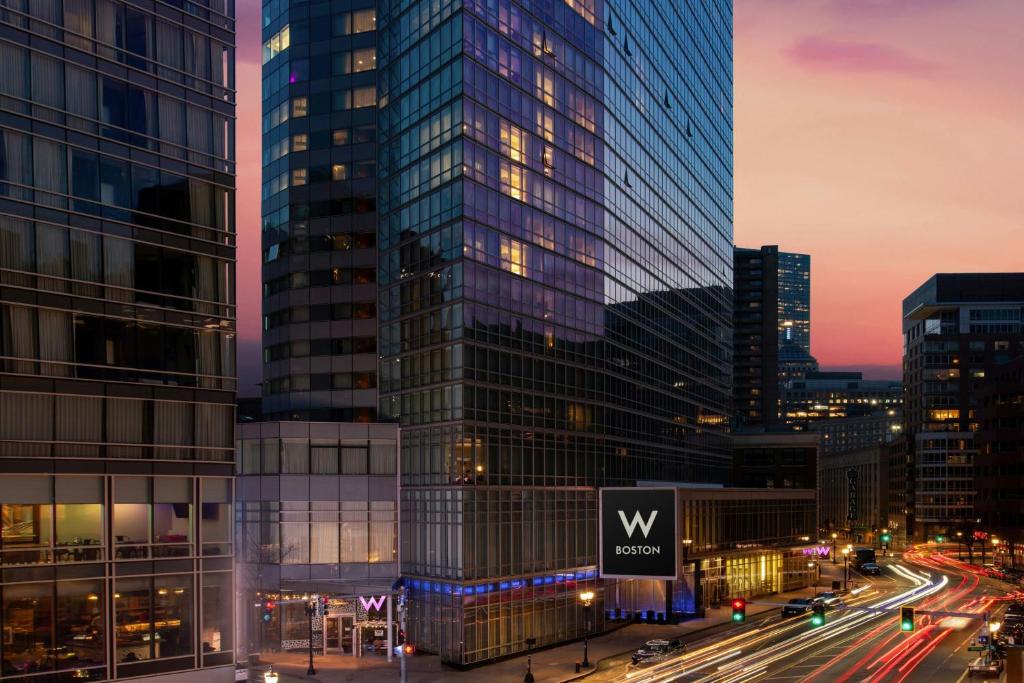 a view of a city at night with buildings at W Boston in Boston