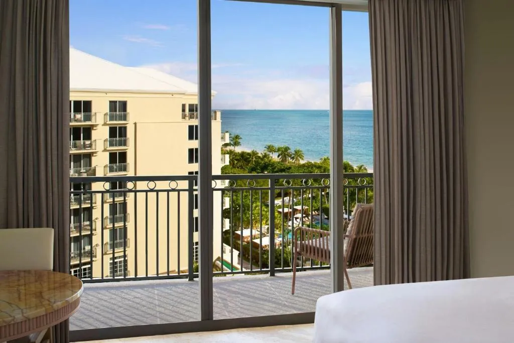 Room with Two Queen Beds, Balcony and Partial Ocean View