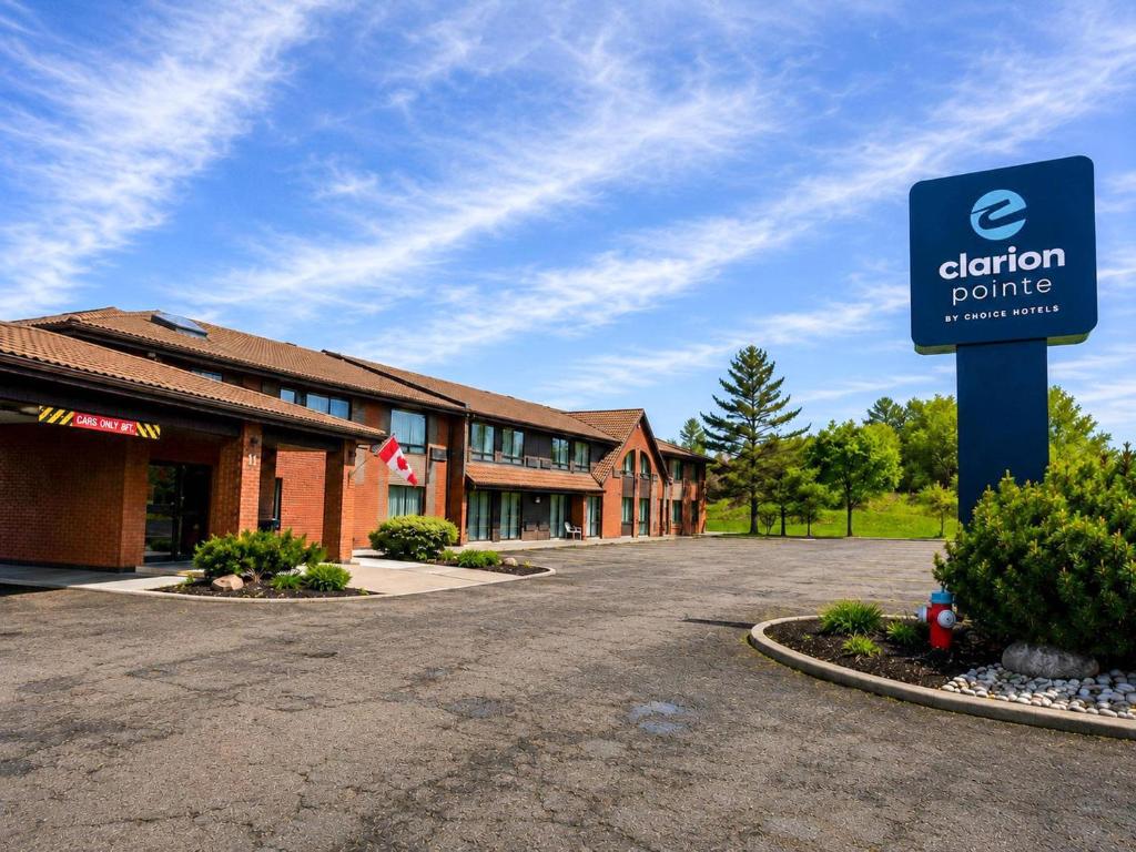 a sign for the entrance to a hotel at Clarion Pointe in Campbellton