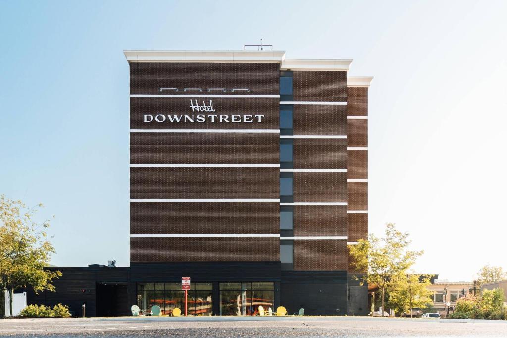 a building with a sign on the side of it at Hotel Downstreet, an Ascend Collection Hotel in North Adams