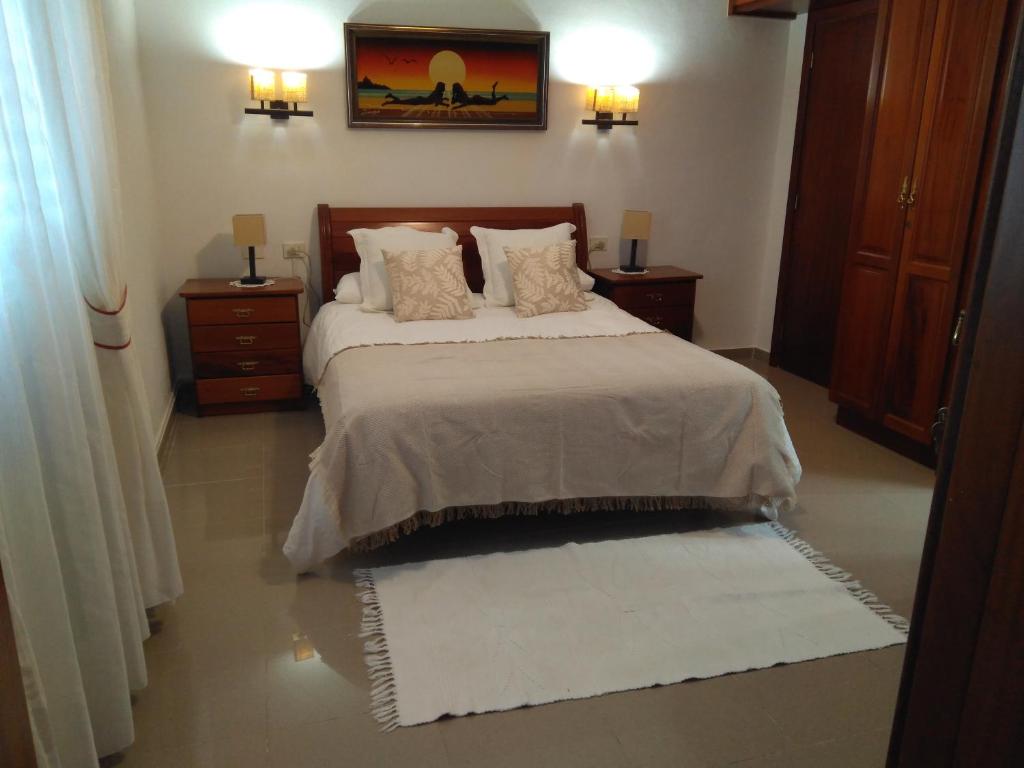 Posteľ alebo postele v izbe v ubytovaní Vivienda Vacacional Paseo Mirabal