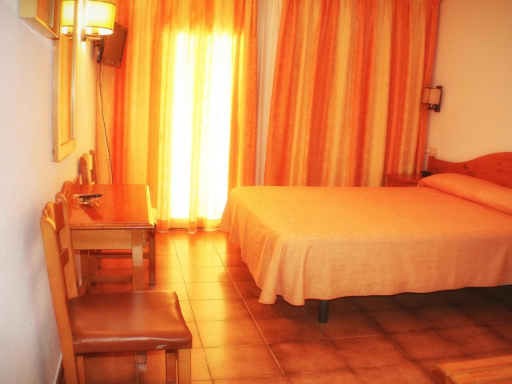 Postel nebo postele na pokoji v ubytování Hotel Parc
