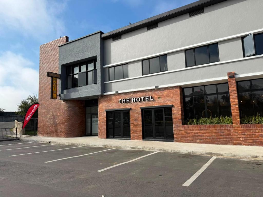 a brick building with the hotel written on it at Railway Hotel in Wellington