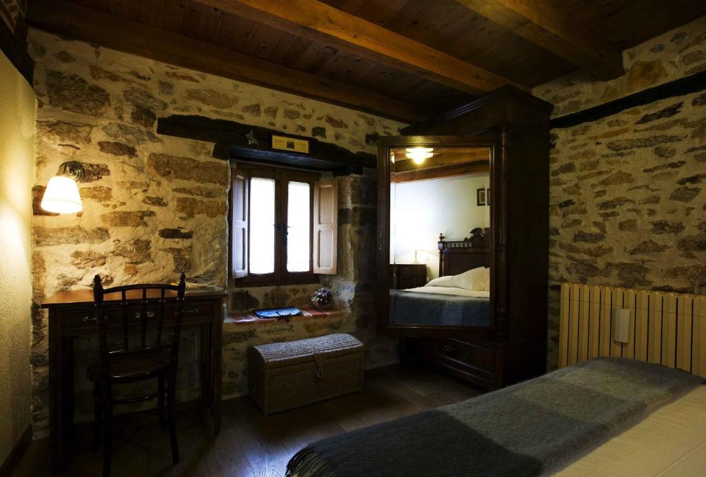 Postel nebo postele na pokoji v ubytování Posada El Prado Mayor