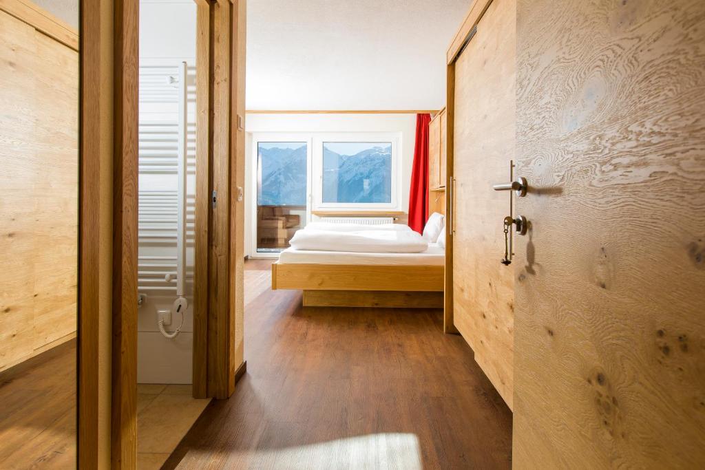 Postel nebo postele na pokoji v ubytování Aparthotel Hohe Brücke