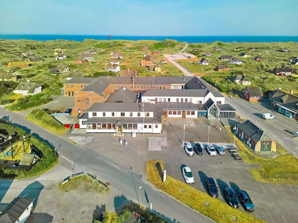 an aerial view of a building with a parking lot at Vedersø Holiday Center in Ulfborg