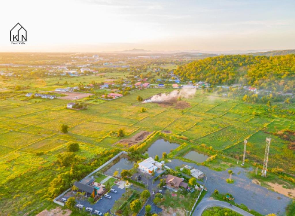 an aerial view of a park with a pond at KN Pool Villa Saraburi in Ban Huai Sai (1)