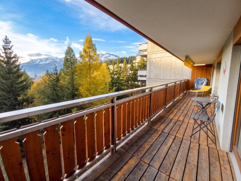a balcony with a view of the mountains at Spacious Apartment in Lens with Mountain View in Lens
